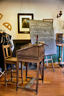 Teacher's Desk and Blackboard